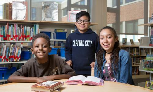 Students smiling at camera