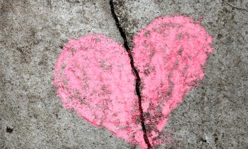 Broken heart on the sidewalk