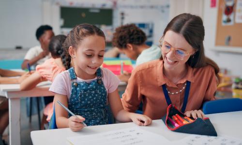 Teaching Tips: Summer School for English Language Learners Teacher with a student