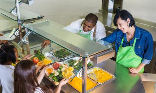 Food service workers serving students