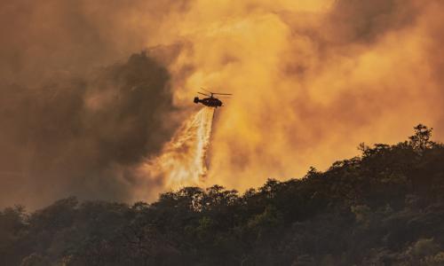 Helicopter fighting wildfires