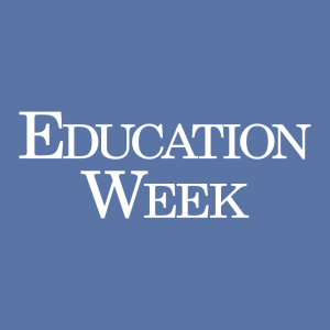 Periwinkle blue Education Week logo.