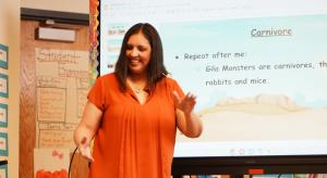 Teacher teaching the word 'carnivore'