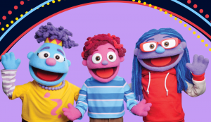 Three colorful puppets smiling