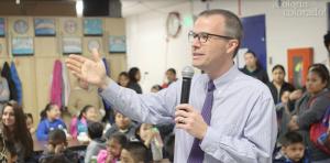 Principal talking with families