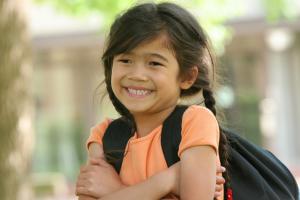 Young girl with backpack