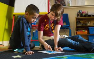 Teacher helping a student