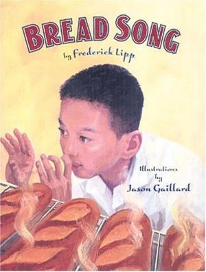 A boy smelling bread