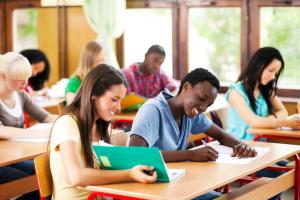 Students writing at their desks