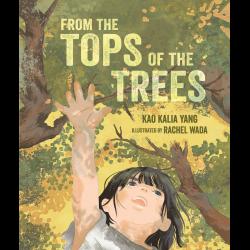 Young girl reaches for the top of a tree