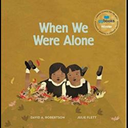 When We Were Alone Two girls in uniforms lying in flowers