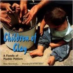 Children of Clay: A Family of Pueblo Potters Baby near adults sculpting a pot