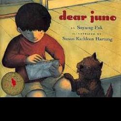 Dear Juno Young boy sitting with his pet