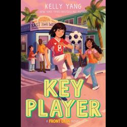 Mia Tang kicking a soccer ball