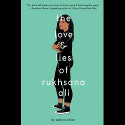 Young woman standing with arms crossed