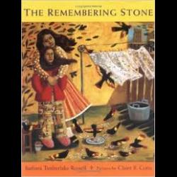 The Remembering Stone A woman watching birds fly