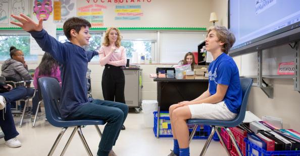 Students acting out a vocabulary word