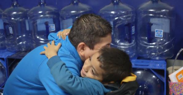 Father hugging a son