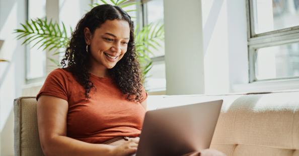 Teacher looking at a laptop