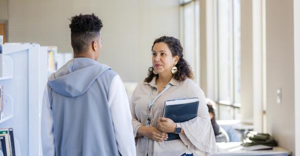 Teacher talking with a student