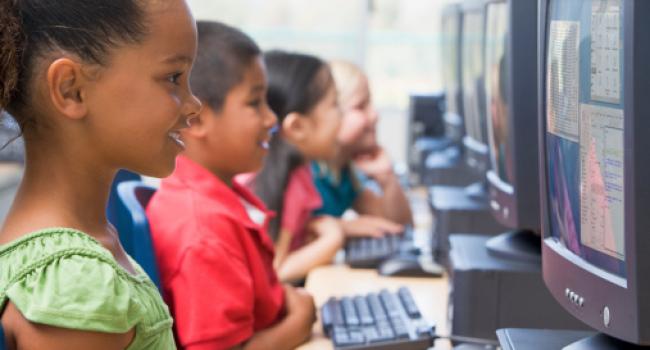 Children working on computers.