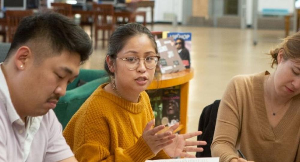 Teacher talking with colleagues