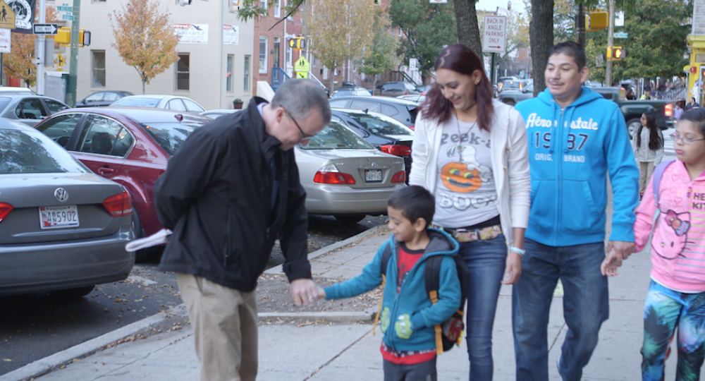 New! Back-to-School Tips: 8 Tips for Partnering with ELL Families Principal welcoming a family