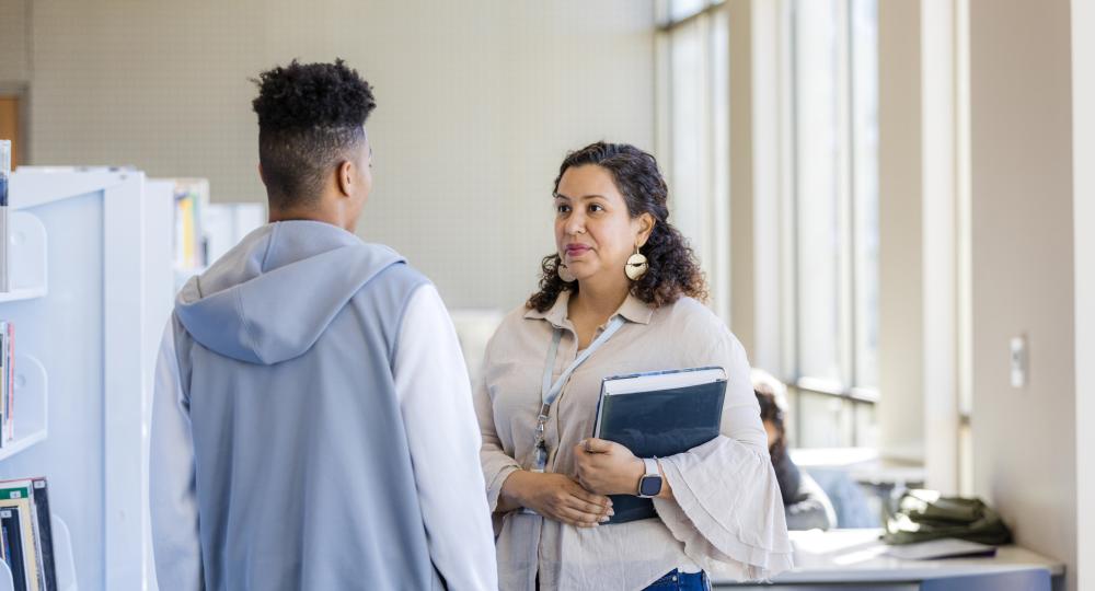 Teacher talking with a student