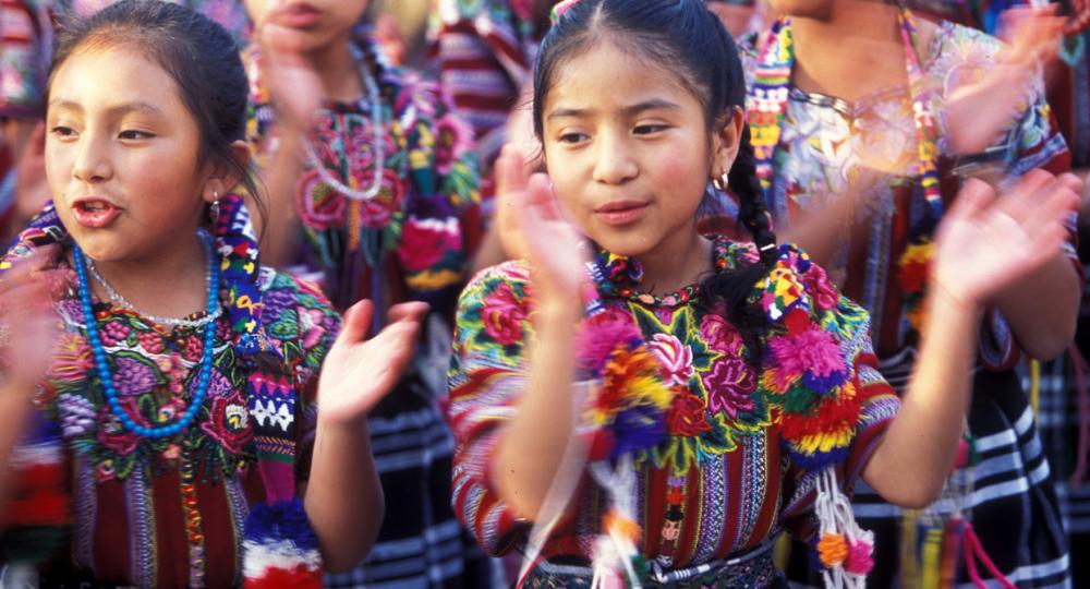 Young Indigenous girls dancing